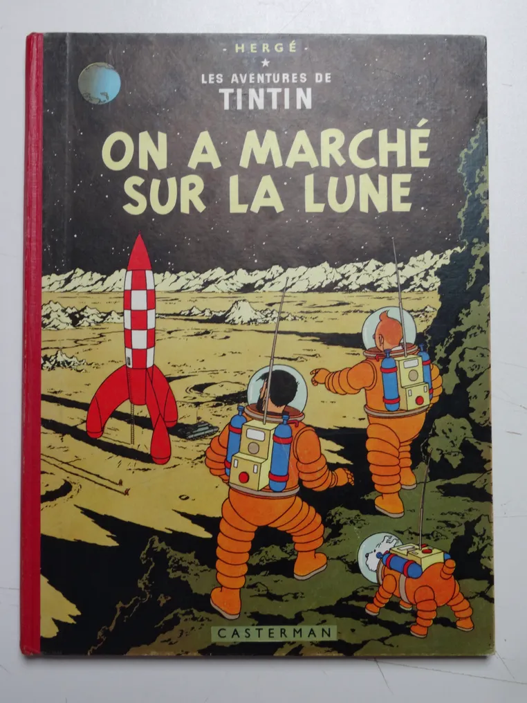 Un album de « Tintin : On a marché sur la Lune » signé par des astronautes en vente sur Catawiki